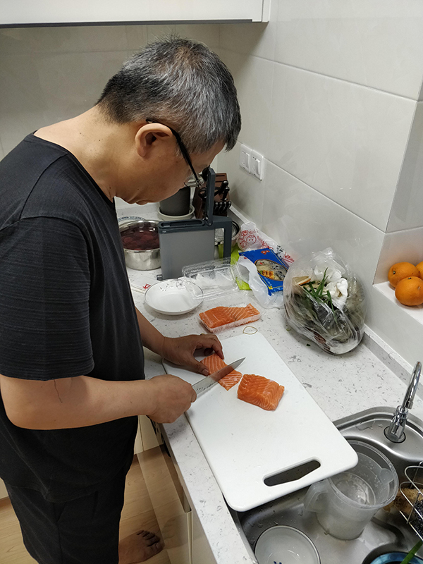 Dad Cutting Salmon